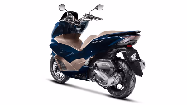 PCX azul vista lateral traseira esquerda